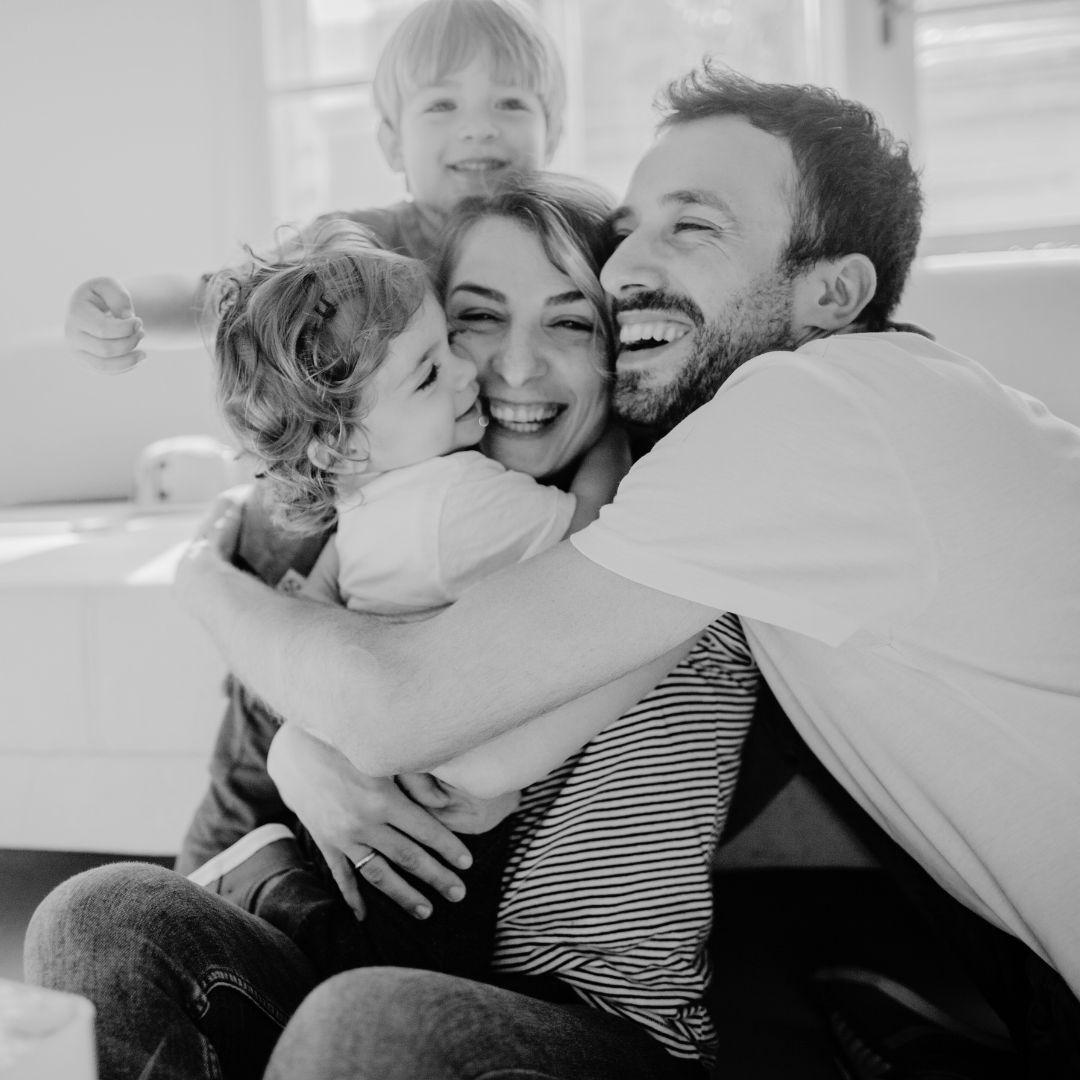 Fulton - 1 family embracing, photo in black and white